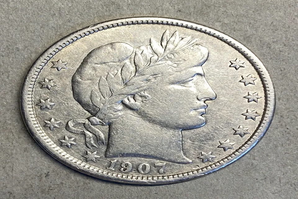 how much is a Barber half dollar worth — 1907 Barber half dollar obverse with the Liberty head portrait, laurel wreath cap, and 1907 date