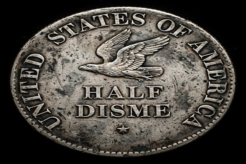 Reverse of the 1792 half disme with eagle and HALF DISME inscription