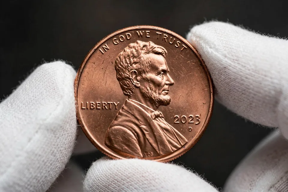 doubled die obverse identification — Lincoln cent obverse under close inspection showing doubled lettering