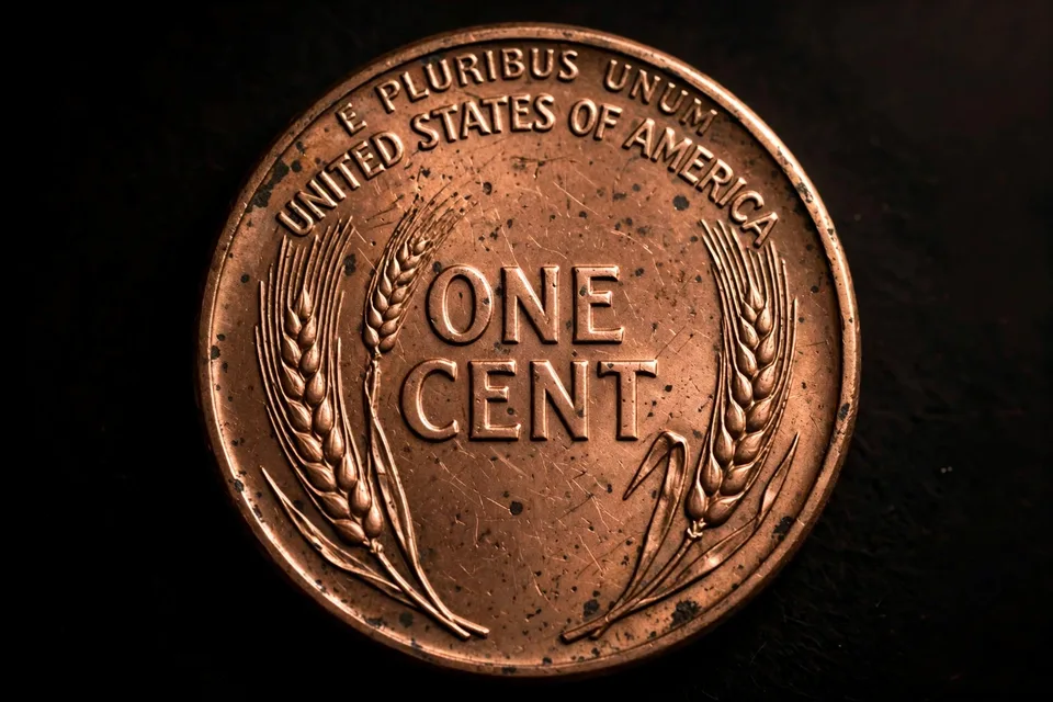 doubled die reverse identification — Lincoln wheat penny reverse with wheat ears and raised lettering