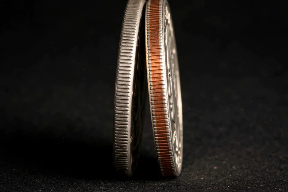 silver half dollar solid silver edge versus clad half dollar copper stripe edge comparison