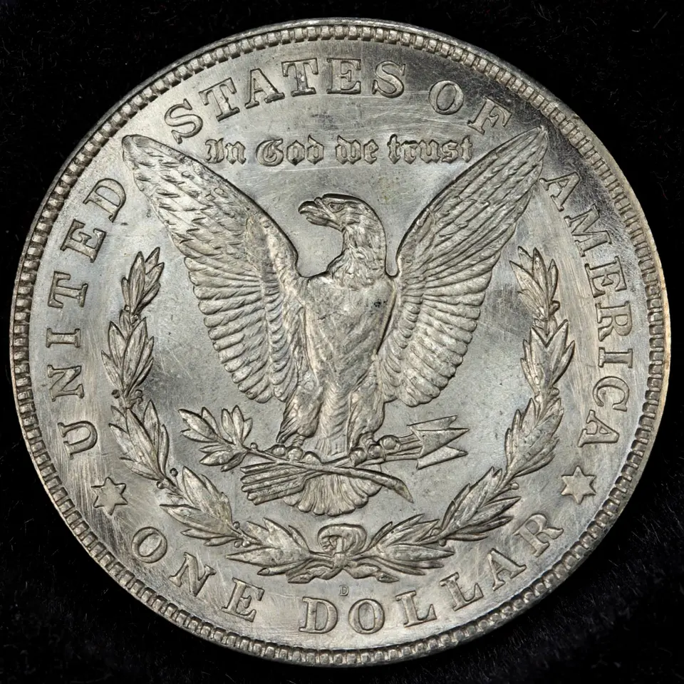 1921 Morgan dollar reverse close-up — heraldic eagle in a wreath with D mint mark below the wreath above ONE DOLLAR