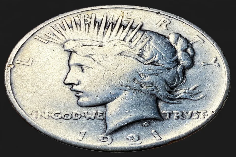 how much is a Peace dollar worth — 1921 Peace dollar obverse with Liberty wearing a spiked crown and 1921 date