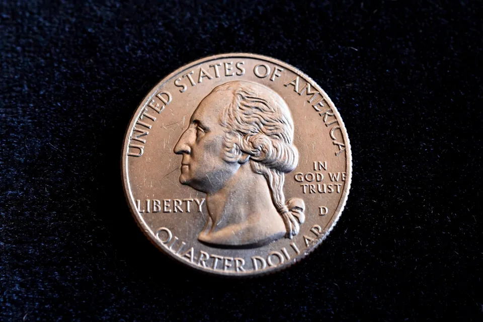 how to identify a wrong planchet coin — Washington quarter design struck on a smaller nickel planchet, rim lettering cut off at the edges